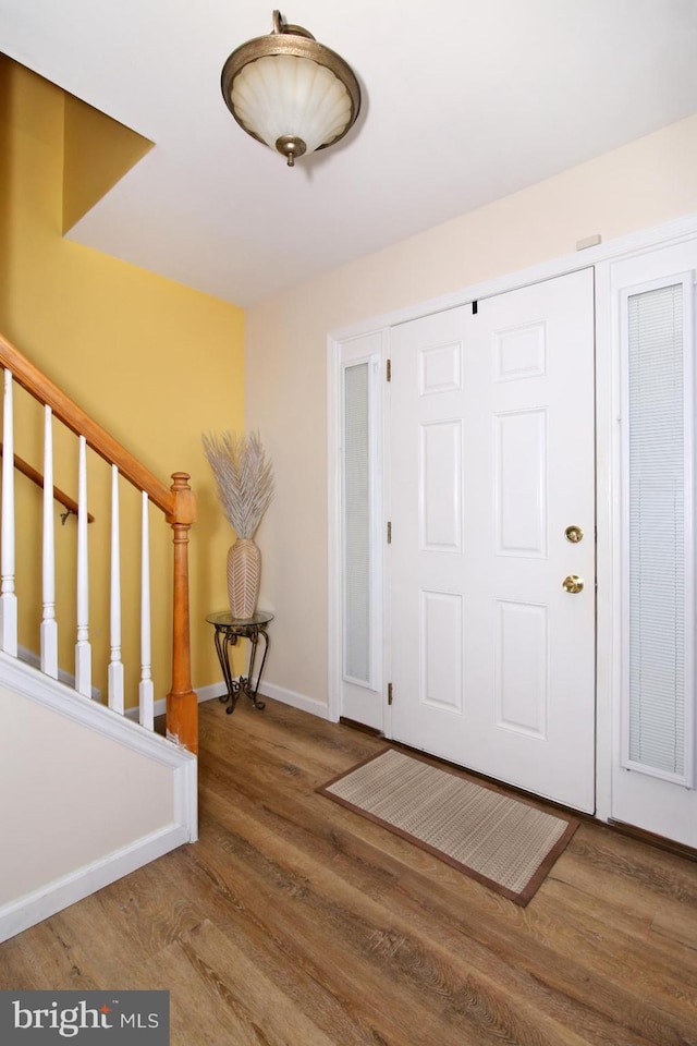 entrance foyer featuring hardwood / wood-style floors