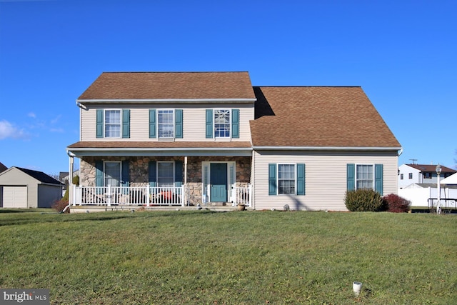 colonial home with a porch and a front lawn