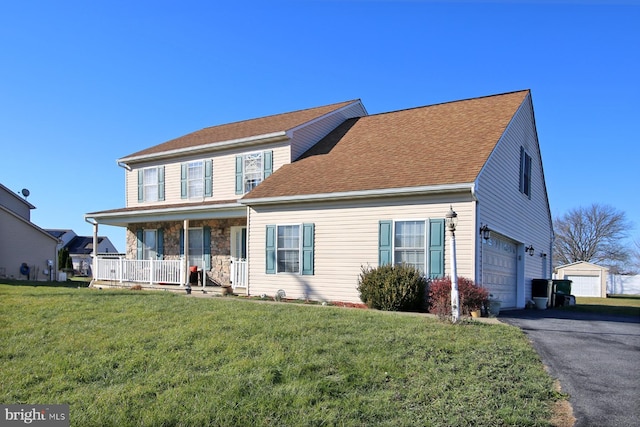 view of front of house with a front lawn and a porch