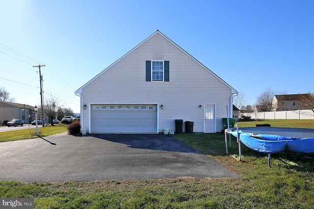 view of side of home featuring a yard