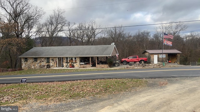 560 Frosty Hollow Rd, Fisher, WV 26818 - view of front of house featuring stone siding and a porch