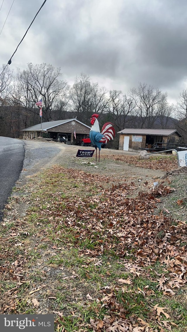 560 Frosty Hollow Rd, Fisher, WV 26818 - view of yard featuring asphalt driveway
