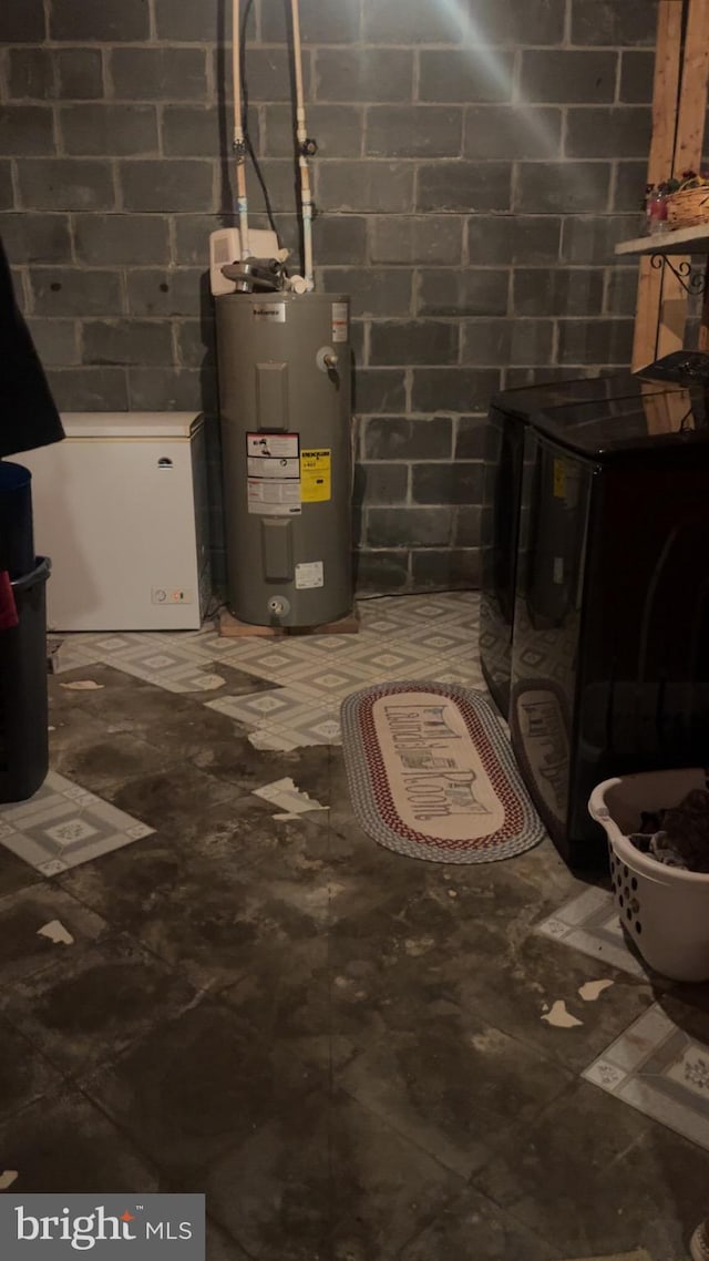 560 Frosty Hollow Rd, Fisher, WV 26818 - utilities featuring water heater and washer / clothes dryer