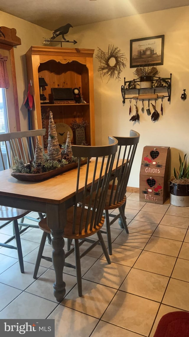 dining room featuring tile patterned flooring