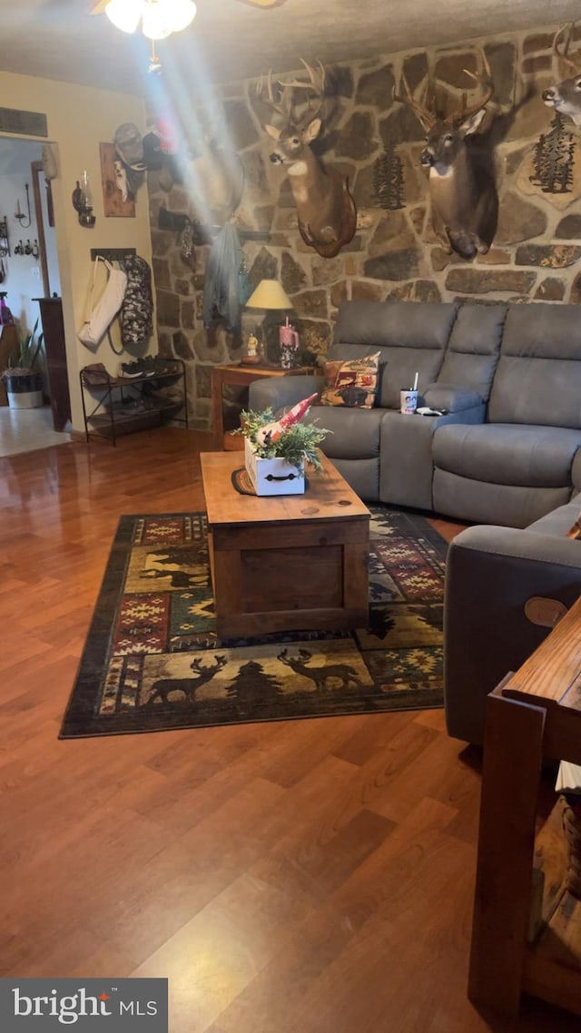 560 Frosty Hollow Rd, Fisher, WV 26818 - living room with wood finished floors and a ceiling fan