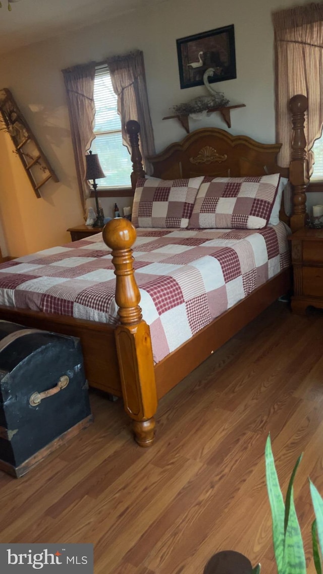 bedroom featuring hardwood / wood-style flooring