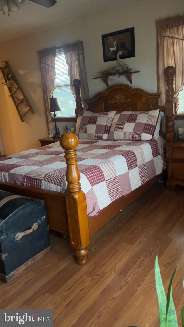 560 Frosty Hollow Rd, Fisher, WV 26818 - bedroom with wood finished floors