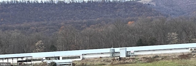 560 Frosty Hollow Rd, Fisher, WV 26818 - bird's eye view of a heavily wooded area and a mountain backdrop