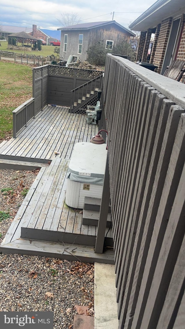 560 Frosty Hollow Rd, Fisher, WV 26818 - wooden terrace featuring a hot tub