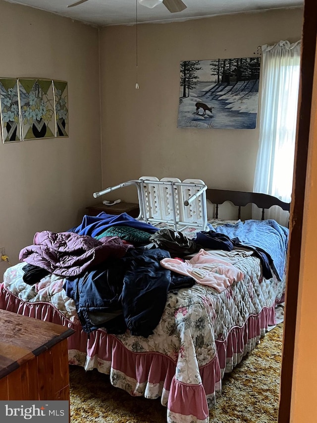 bedroom with carpet flooring and ceiling fan