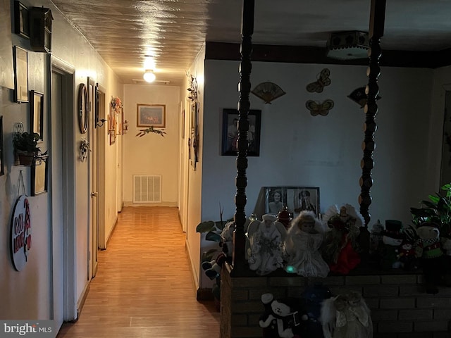560 Frosty Hollow Rd, Fisher, WV 26818 - corridor featuring light wood-type flooring