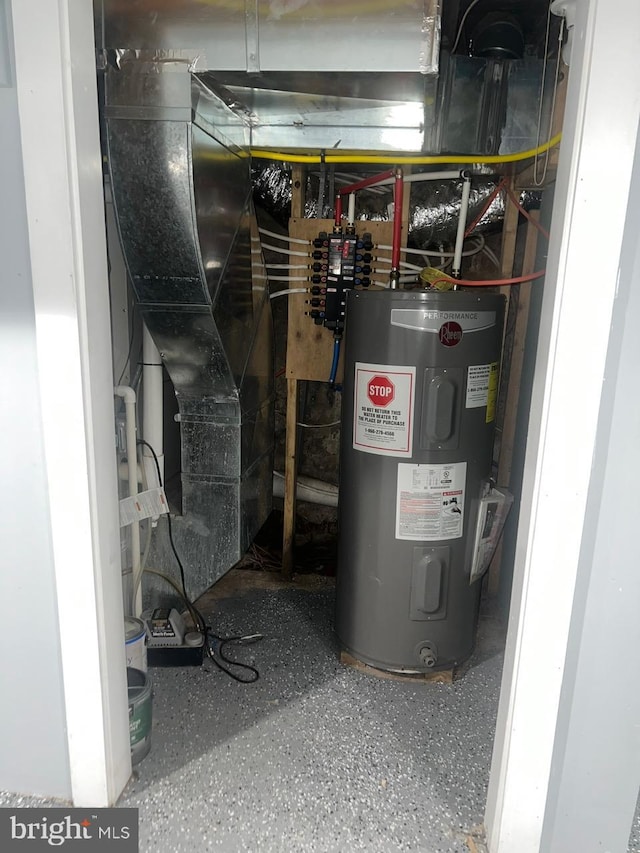 utility room with electric water heater