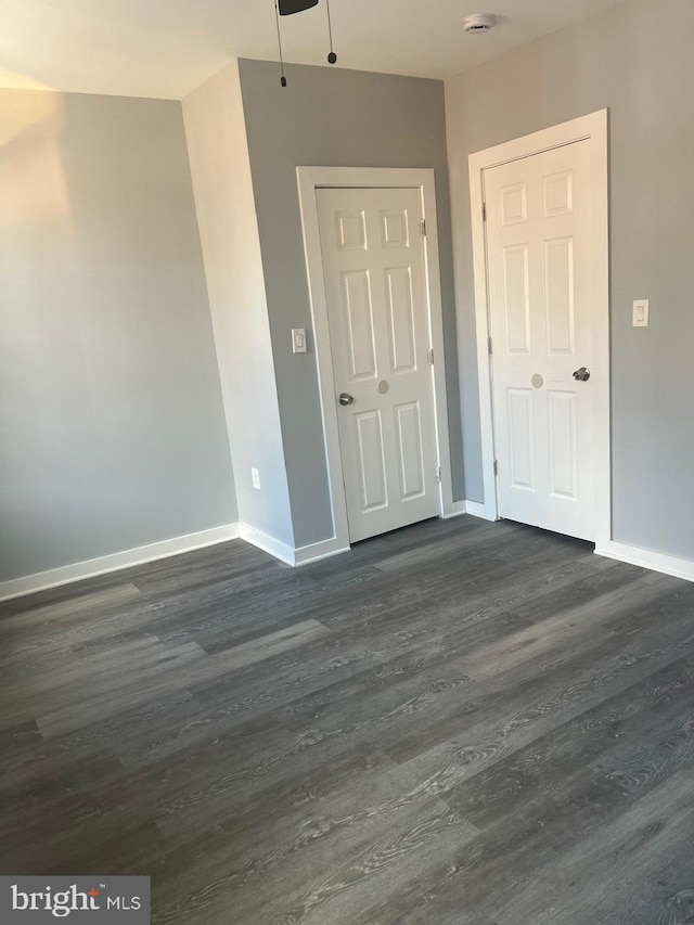 interior space featuring dark wood-type flooring