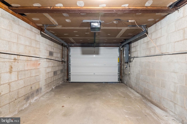 garage featuring a garage door opener