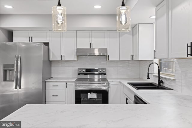 kitchen featuring white cabinets, sink, and stainless steel appliances