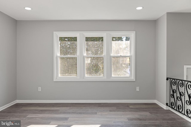 empty room with wood-type flooring