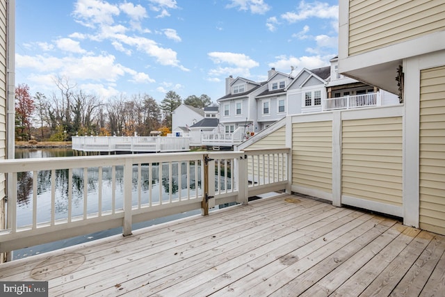 wooden terrace with a water view