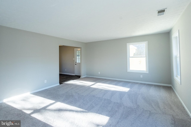 spare room with carpet floors