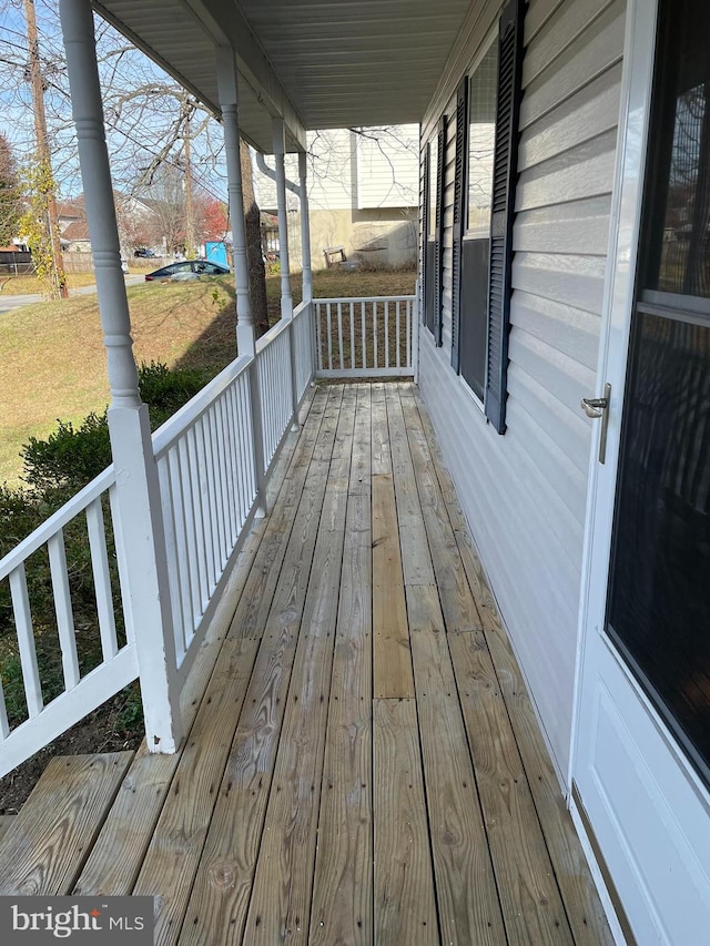 wooden deck featuring a porch