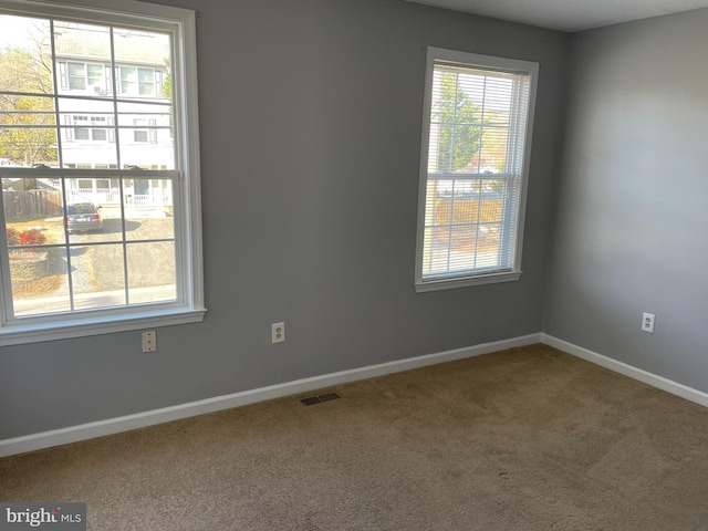 view of carpeted spare room