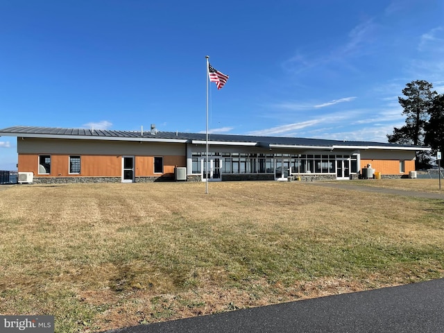 view of building exterior with cooling unit