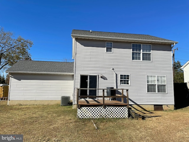 back of house featuring a lawn, cooling unit, and a deck