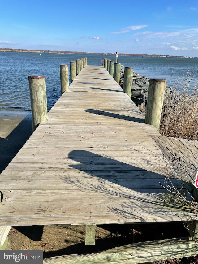 view of dock with a water view