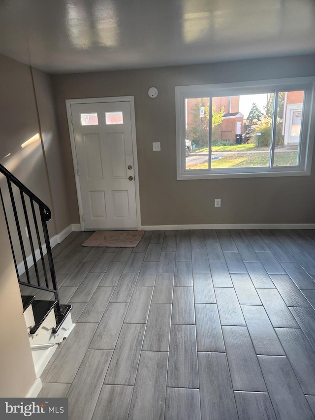 entrance foyer with light wood-type flooring