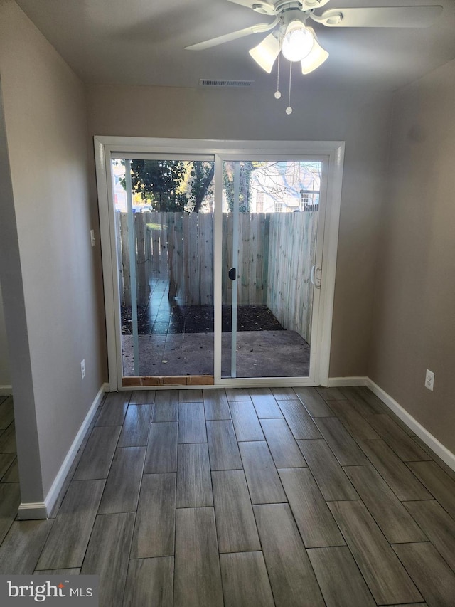 interior space with ceiling fan and hardwood / wood-style floors