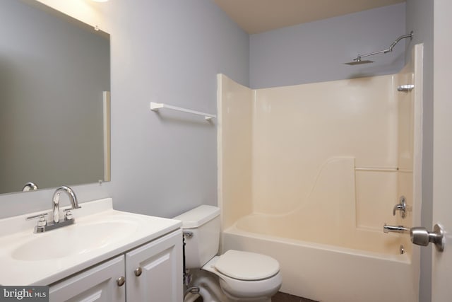 full bathroom with shower / tub combination, vanity, and toilet