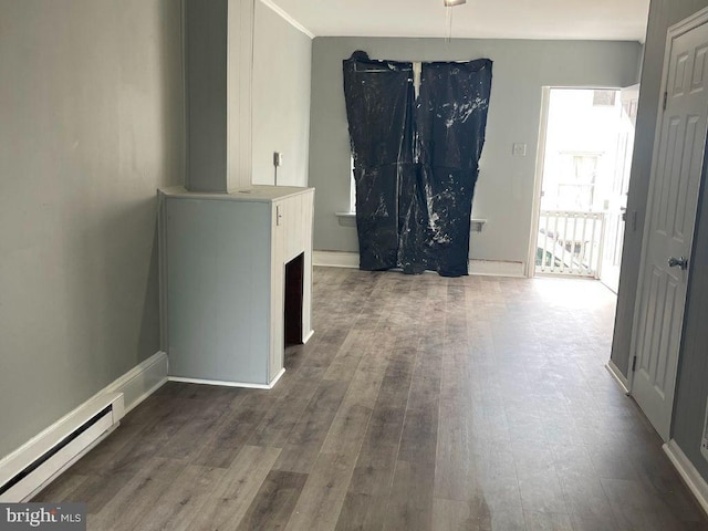 interior space with hardwood / wood-style floors and a baseboard radiator