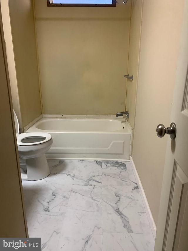 bathroom with shower / tub combination and toilet