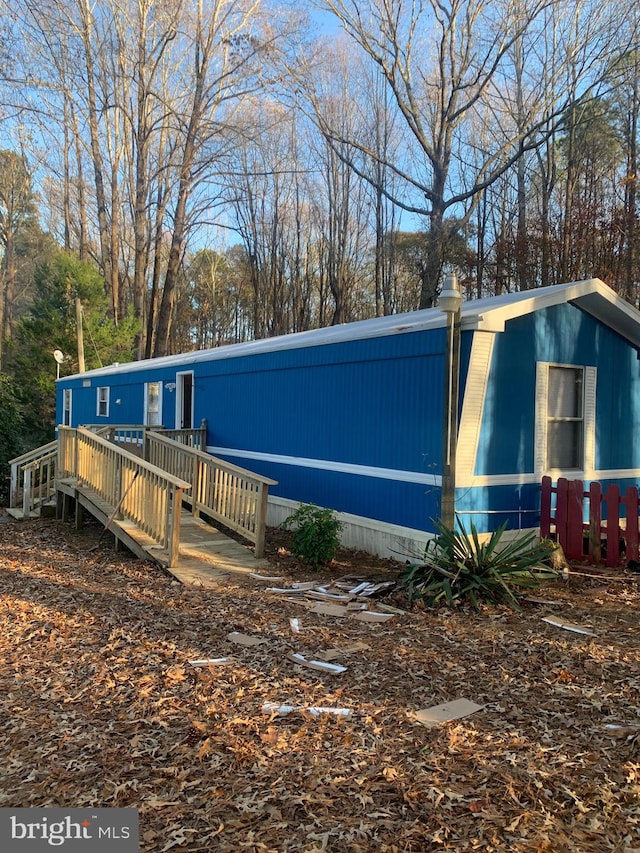 view of front of house featuring a deck