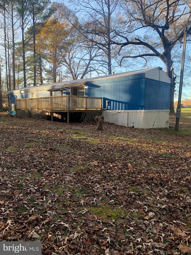 view of yard with a wooden deck