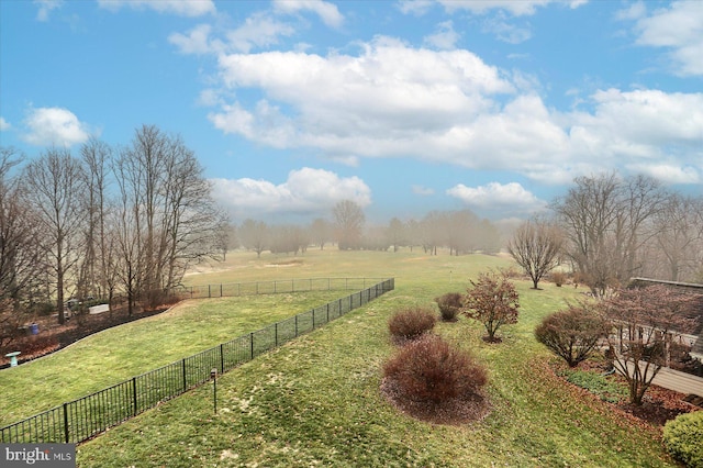 view of yard with a rural view