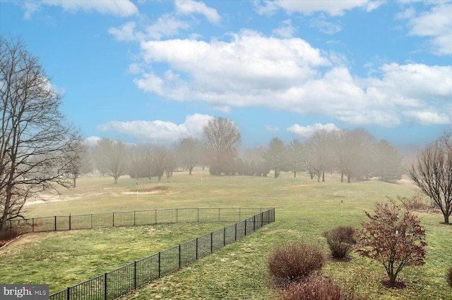 view of yard with a rural view