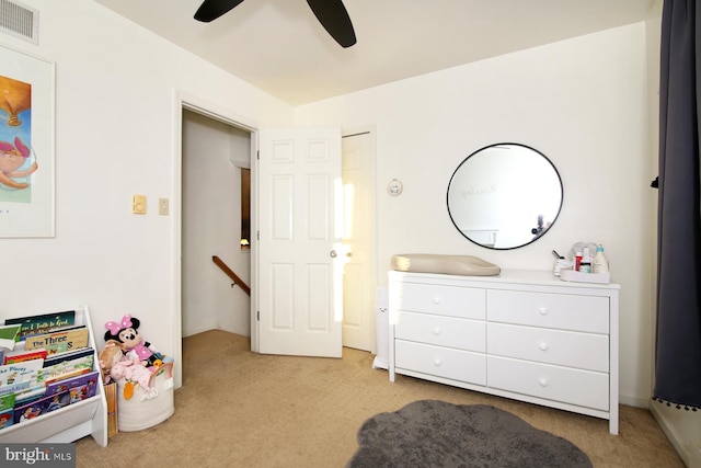 carpeted bedroom featuring ceiling fan