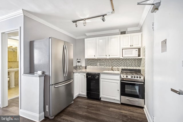 kitchen featuring white cabinets, stainless steel appliances, and dark hardwood / wood-style floors