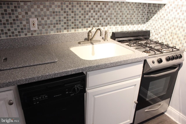 kitchen featuring tasteful backsplash, gas stove, sink, dishwasher, and white cabinetry