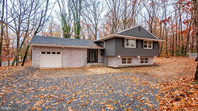 split level home featuring a garage