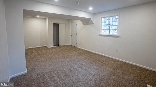 basement with carpet flooring