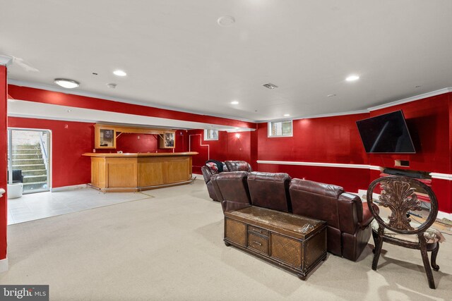 cinema featuring bar area and light carpet