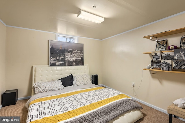 carpeted bedroom featuring baseboards and crown molding