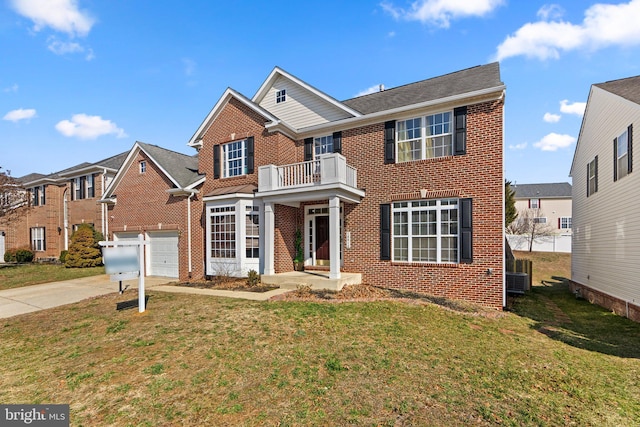 view of front facade with brick siding, a balcony, a garage, driveway, and a front lawn