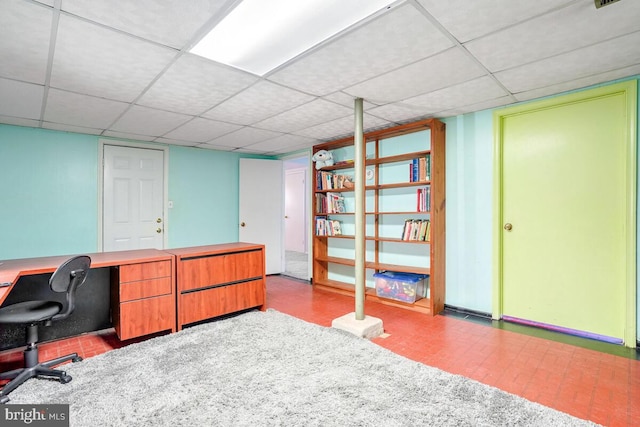 office area featuring a paneled ceiling