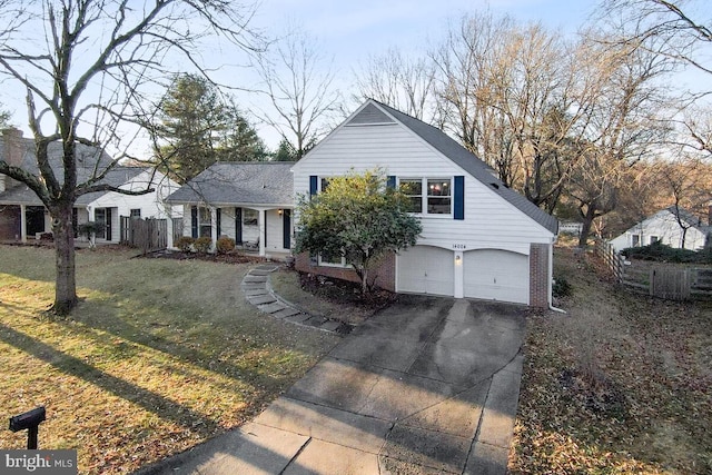 view of front facade with a garage and a front yard