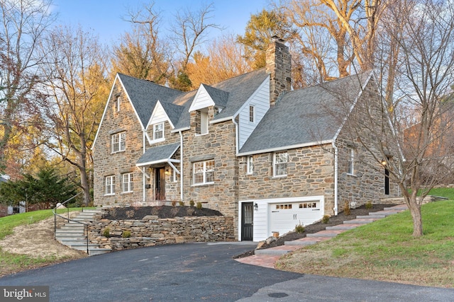 view of front of house with a garage