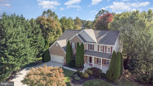 view of front of house featuring a garage and covered porch