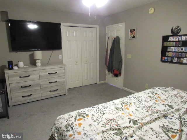 carpeted bedroom featuring a closet