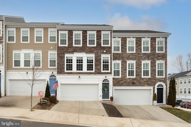 view of front of home with a garage